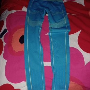 Brand new aqua and yellow leggings size xs